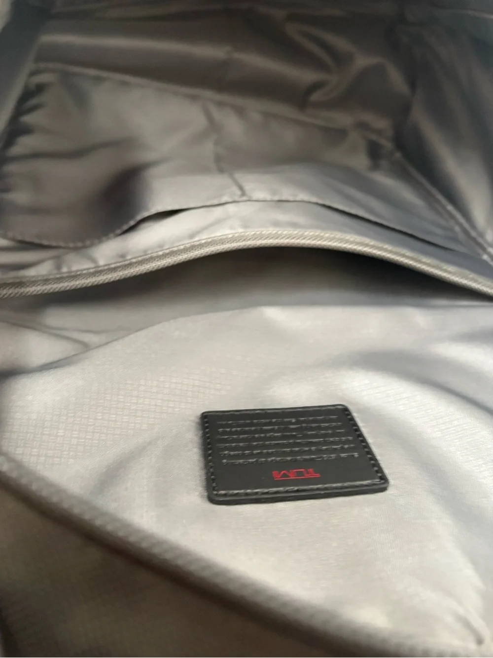 Tumi sleek backpack